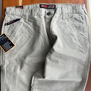Men’s FR khaki work pants with utility tool pockets. Low rise boot cut. NWT